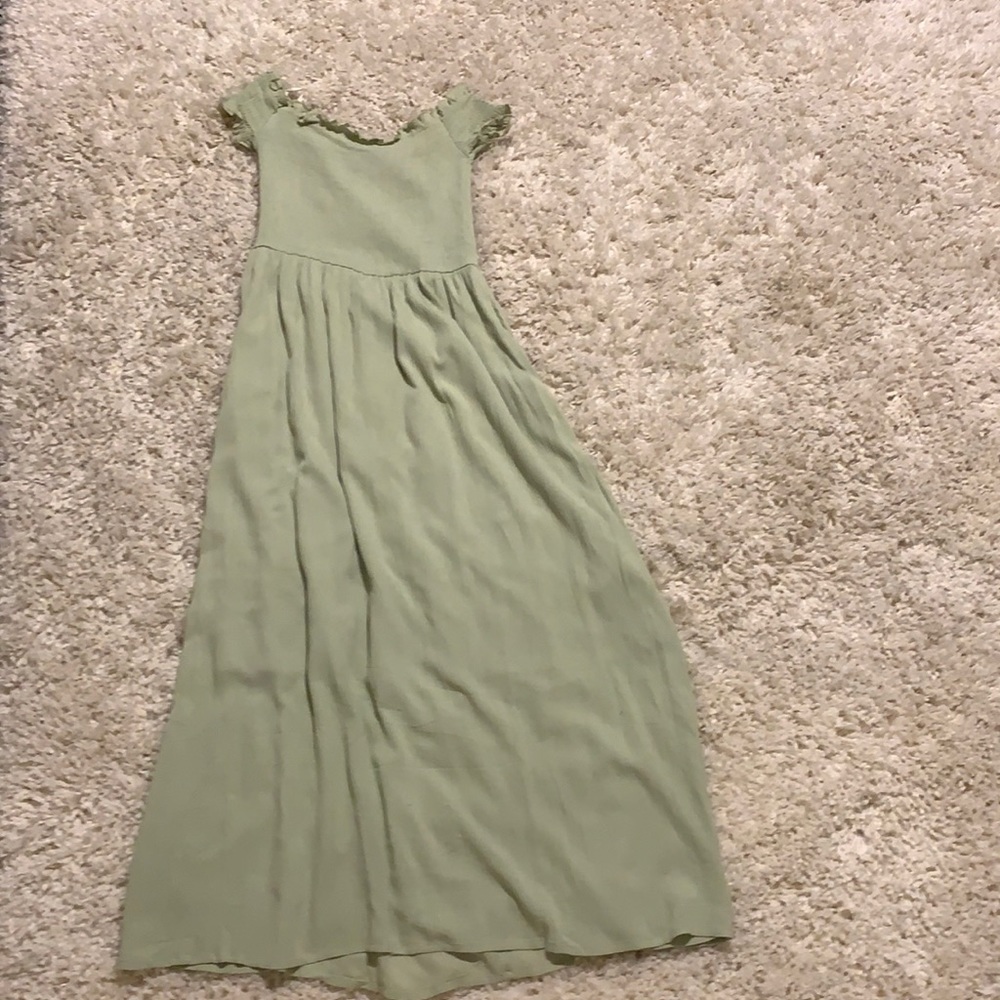 It is a green dress for teens.